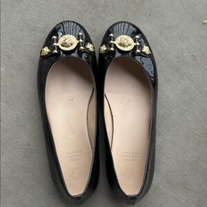 Versace Black and Gold Flats with Timeless Elegance